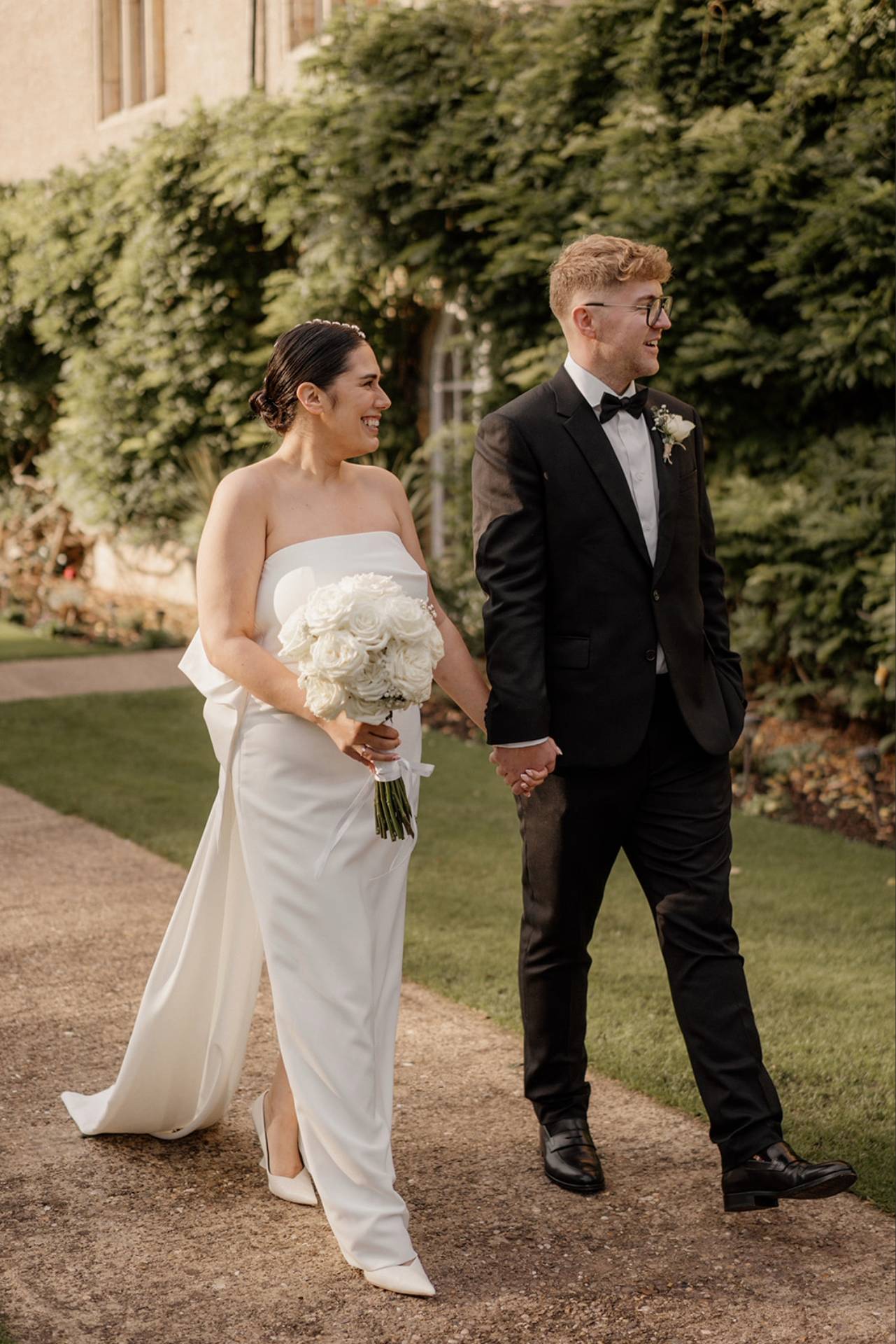 wedding couple walk together photographed by nottingham photographer
